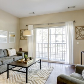 Gorgeous living areas to entertain and enjoy living room with large windows and a couch